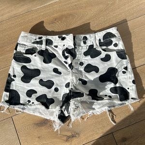 Forever 21 cow print Jean shirts , frayed at bottom . Great condition